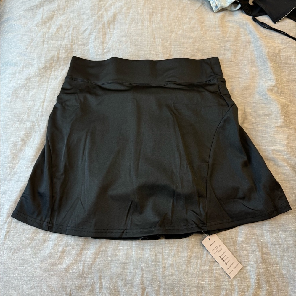 Tennis skirt. Never worn. Size Xl